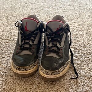 Jordan Black and Gray Sneakers with Red Highlights